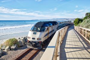 Metrolink Commuter Train running along San Clemente Beach.