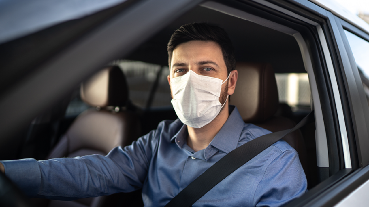 Driver wearing face mask